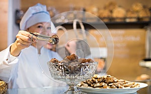 Women selling tarts and sweet pastry