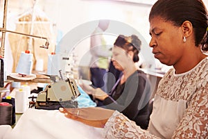 Women sewing at a community project workshop, South Africa