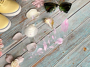 Women shoes , Relax Time Sneakers  yellow shoe , sunglasses ,seashell and flowers on  pink blue background ,clothes  accessories s