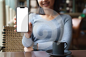 Women sit back and relax in the hotel restaurant, feeling happy