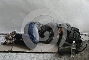 Women sleeping on the roadside