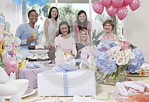 Women Smiling At Baby Shower