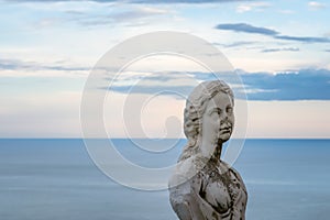 Women Statue from the belvedere, the so-called Terrazza dell`infinito, The Terrace of Infinity seen on the sunset, Villa Cimbrone, photo