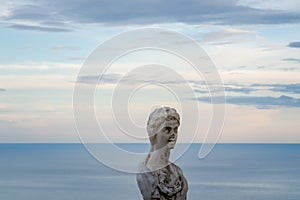 Women Statue from the belvedere, the so-called Terrazza dell`infinito, The Terrace of Infinity seen on the sunset, Villa Cimbrone, photo