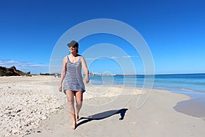 Women taking a morning stroll down port beach