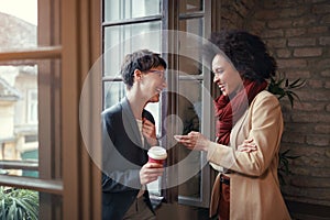 Women are talking in break time in the office