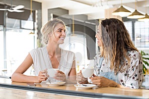 Women talking over coffee photo