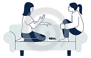 Women talking and sitting on couch. Friends spending time together