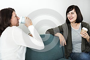 Women talking together on the couch