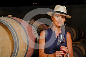 Women tasting wine in a cellar-Winemaker