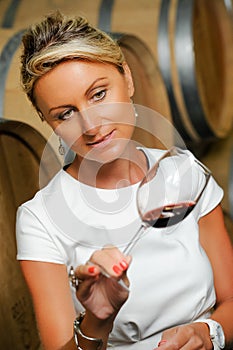 Women tasting wine in a cellar-Winemaker