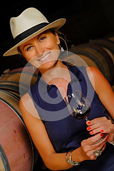 Women tasting wine in a cellar-Winemaker