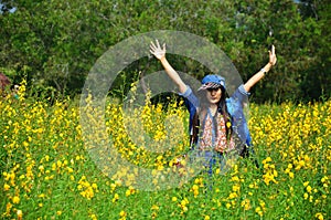 Women Thai Portrait on Crotalaria juncea Field at Countryside Nakornratchasrima