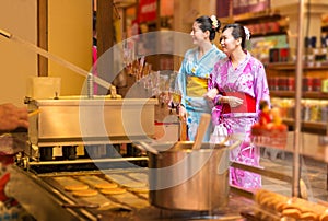 Women tourist dress kimono walking in street