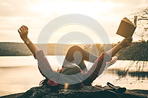 Women tourists read books. photo