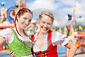 Women in traditional Bavarian clothes or dirndl on festival