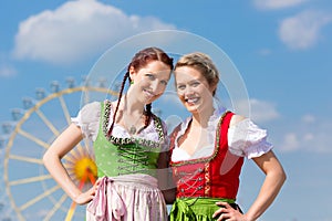 Women in traditional Bavarian clothes or dirndl on festival