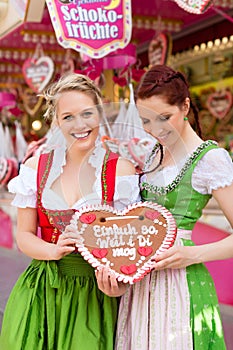 Women in traditional Bavarian clothes or dirndl on festival