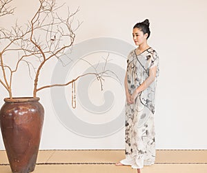 Women and trees and Zen beads-The artistic conception of Zen tea photo
