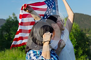 Women with USA flag, celebration of patriotic american national holiday 4th of july independence day