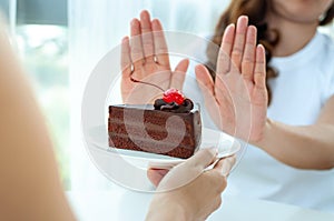 The women used to push the cake plate with the people.  Do not eat desserts for weight loss