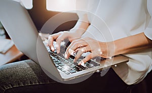 Women using a laptop in the display and technology advances in stores. Take your screen to put on advertising.