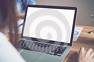 Women using a laptop on white screen. Take your screen to put on advertising.