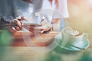 Women using a smartphone in the display and technology advances in stores.The concept of working anywhere with modern technology