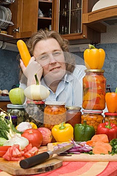 Women with vegetables and jars photo