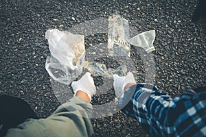 Women volunteer help garbage collection charity.