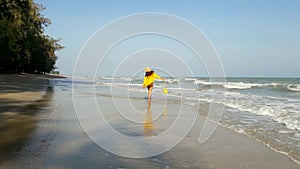 Women walking on the beach.