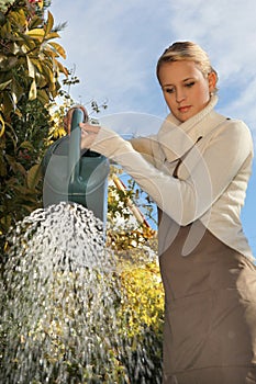Women watering her plants
