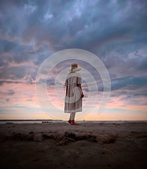 Women wathing sunset dark dramatic cloudy sunset sky , young girl  watching to sea  panorama  wild nature landscape seascape