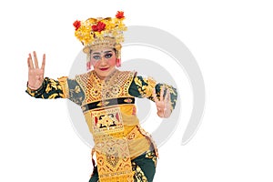 Women wear traditional dance clothes when dancing Balinese