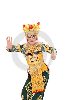 Women wear traditional dance clothes when dancing Balinese