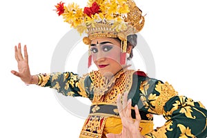 Women wear traditional dance clothes when dancing Balinese