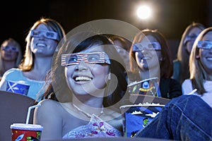 Women Wearing 3-D Glasses In The Theatre