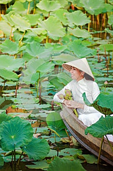 Women wearing Ao Dai dress are Vietnam national costumes.