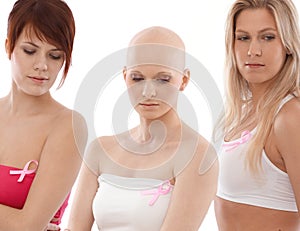 Women wearing Breast Cancer Awereness ribbon photo