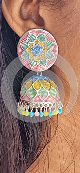 Women wearing earrings  designer jewellery ethnic style makeup accessories