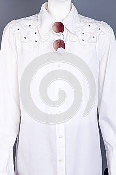 Women white elegant blouse with rhinstones.