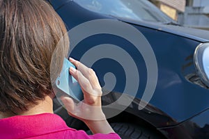 Women who are experiencing a car accident. Contacting insurance