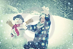 Women in winter clothes. Happy winter time. Winter portrait. Christmas winter poeple. Enjoying nature wintertime.