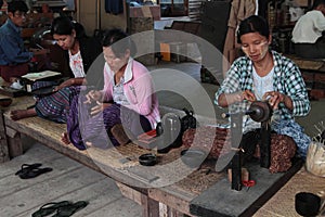 Women work in a factory of lacquerware