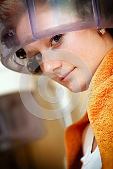 Women working with hair dryer
