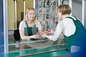 Women working in manufacturing plant