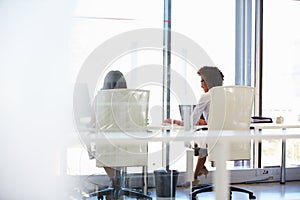 Women working together, office interior