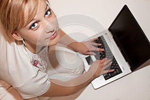 Women write on laptop