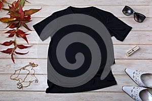 Womens black T-shirt mockup with white heels and grass