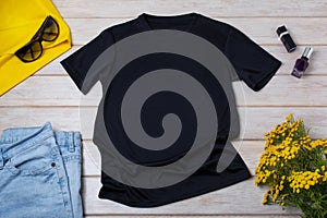 Womens black T-shirt mockup with yellow flowers